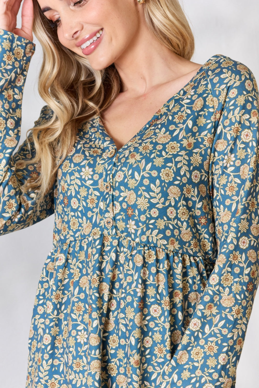 Heimish Full Size Floral Half Button Long Sleeve Blouse 