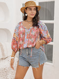 Plus Size Printed Tie Neck Balloon Sleeve Blouse 