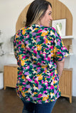 Double Take Full Size Printed V-Neck Short Sleeve Side Slit Top 