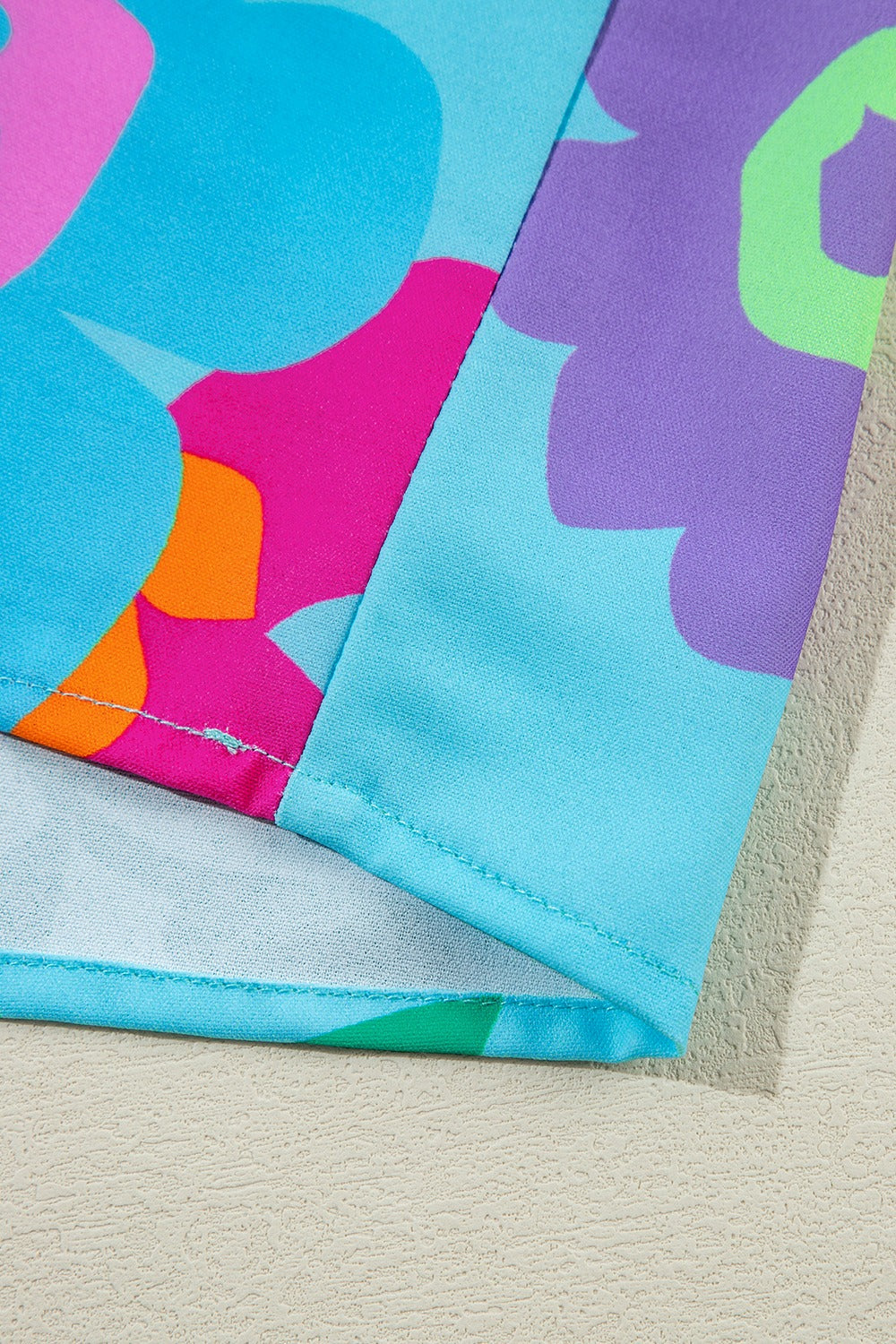 Plus Size Peplum Printed Notched Blouse 