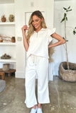 Double Take Full Size Texture Ruffle Short Sleeve Top and Wide Leg Pants Set 