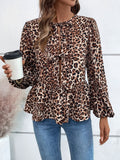 Ivy Lane Peplum Tied Long Sleeve Blouse 
