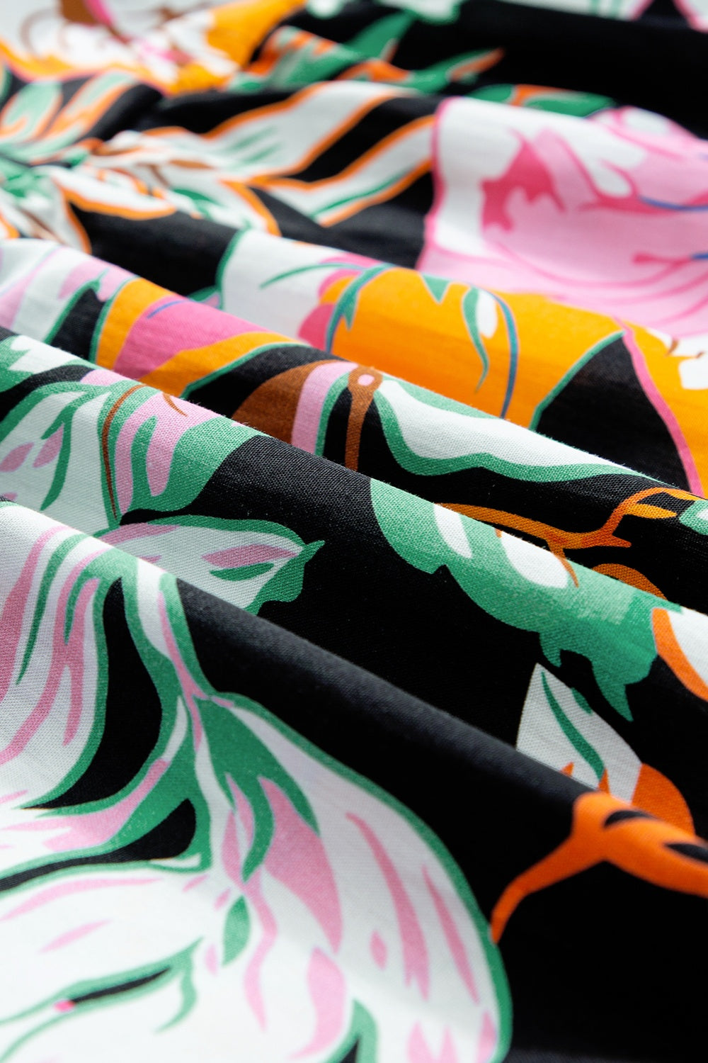 Plus Size Printed Tie Neck Short Sleeve Blouse 