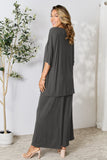 Double Take Full Size Round Neck Slit Top and Pants Set 