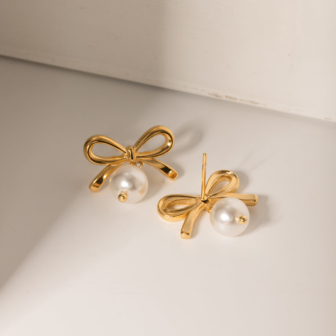 Stainless Steel Bow Pearl Earrings 