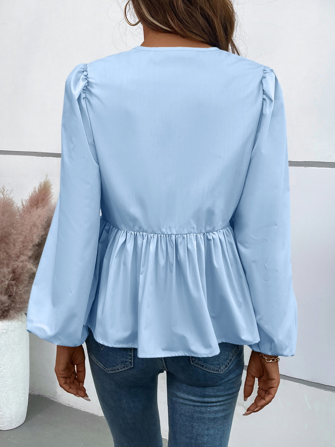 Ivy Lane Peplum Tied Long Sleeve Blouse 