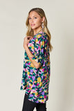Double Take Full Size Printed V-Neck Short Sleeve Side Slit Top 