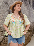 Plus Size Printed Tie Neck Half Sleeve Blouse 