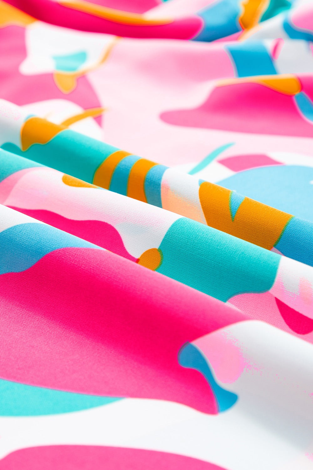 Plus Size Ruffled Printed Notched Cap Sleeve Blouse 