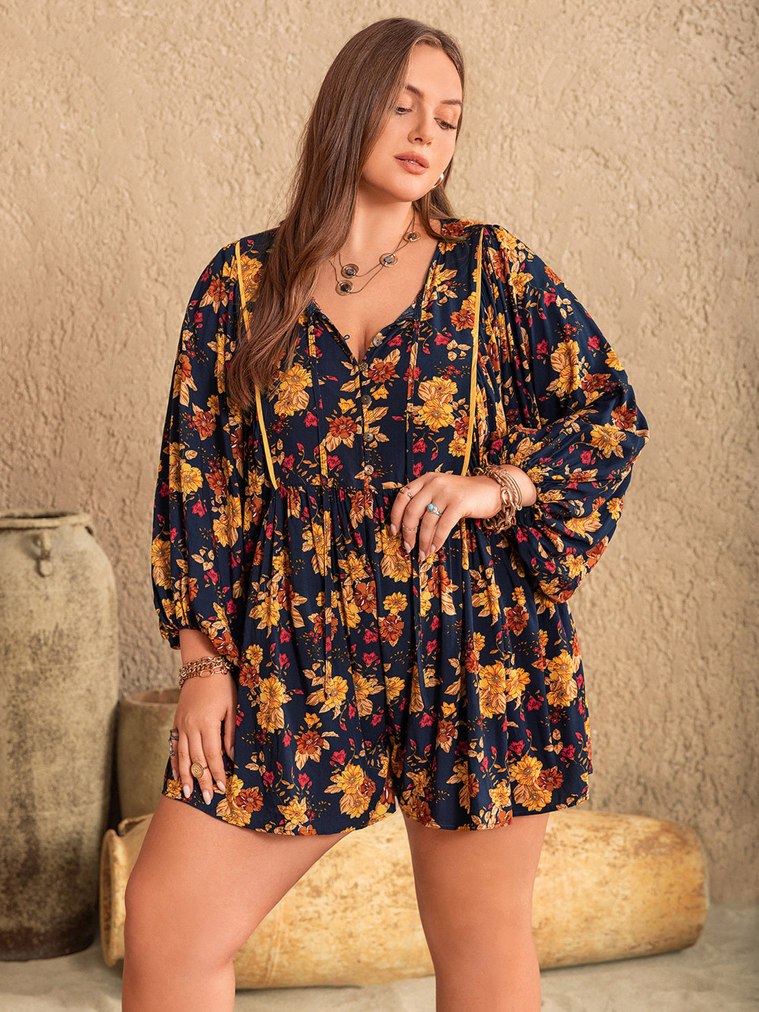 Plus Size Floral Tie Neck Balloon Sleeve Romper 