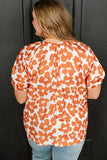 Plus Size Printed Tie Neck Short Sleeve Blouse 