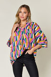 Double Take Full Size Geometric Notched Dolman Sleeve Top 