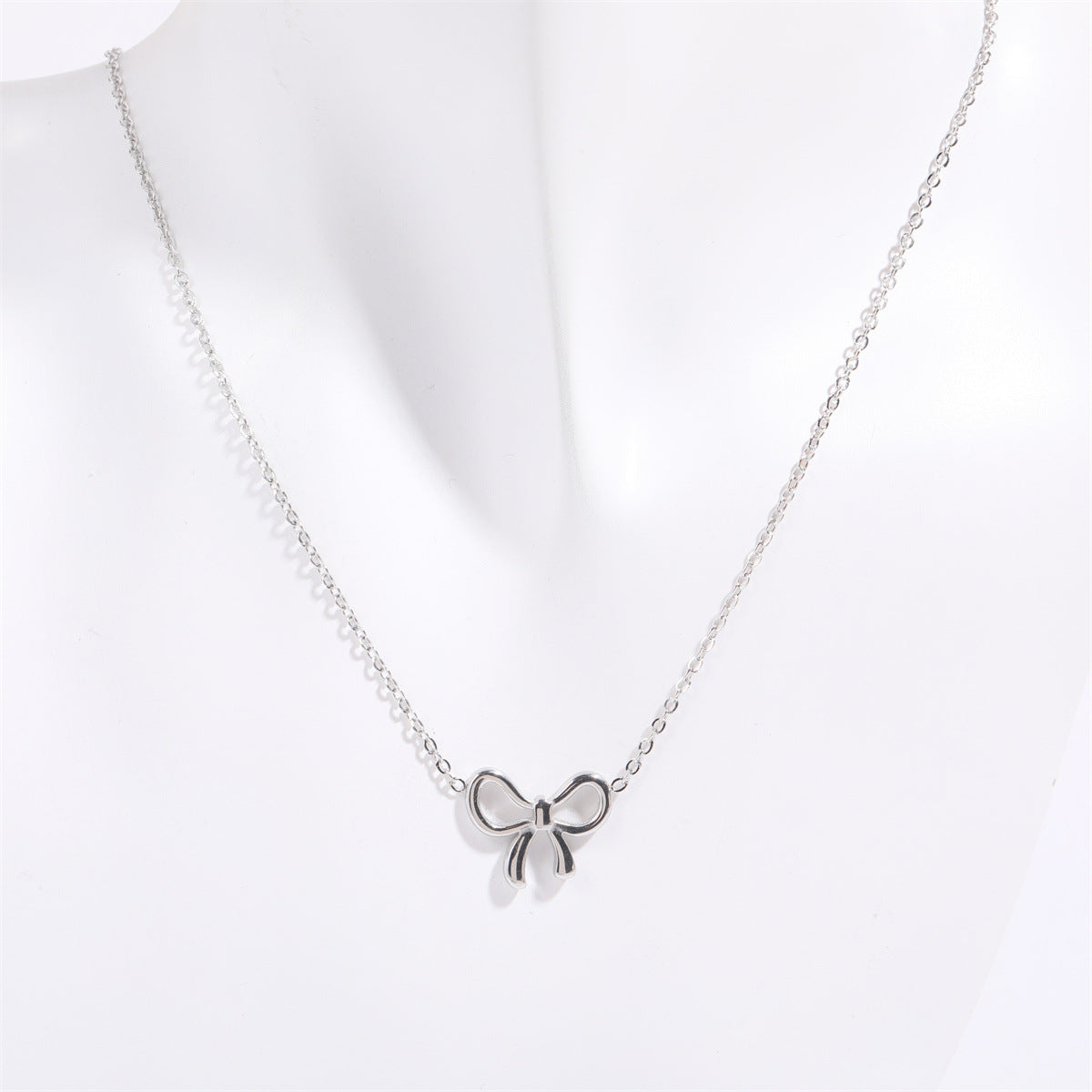 Titanium Steel Bow Pendant Necklace 