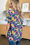 Double Take Full Size Printed V-Neck Short Sleeve Side Slit Top 