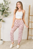 Heimish Full Size Printed Drawstring Pants Pants