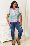 Perfee Floral Tie Neck Short Sleeve Blouse 