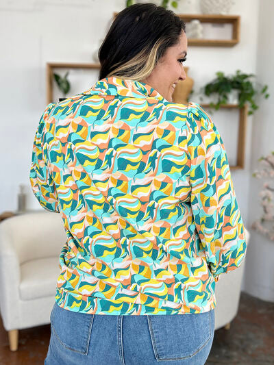 Double Take Full Size Printed Smocked Long Sleeve Blouse 