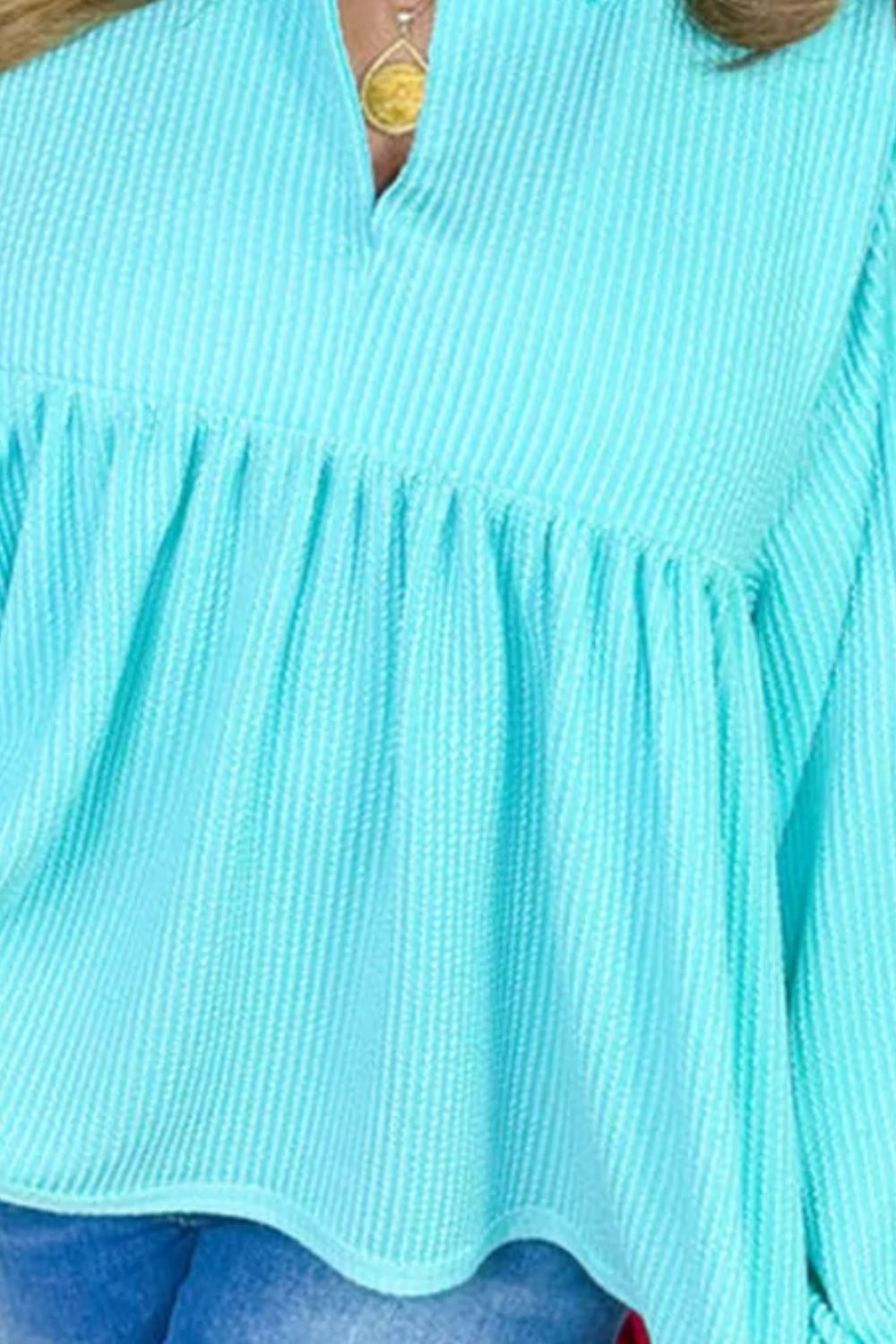 Plus Size Textured Peplum Long Sleeve Blouse 